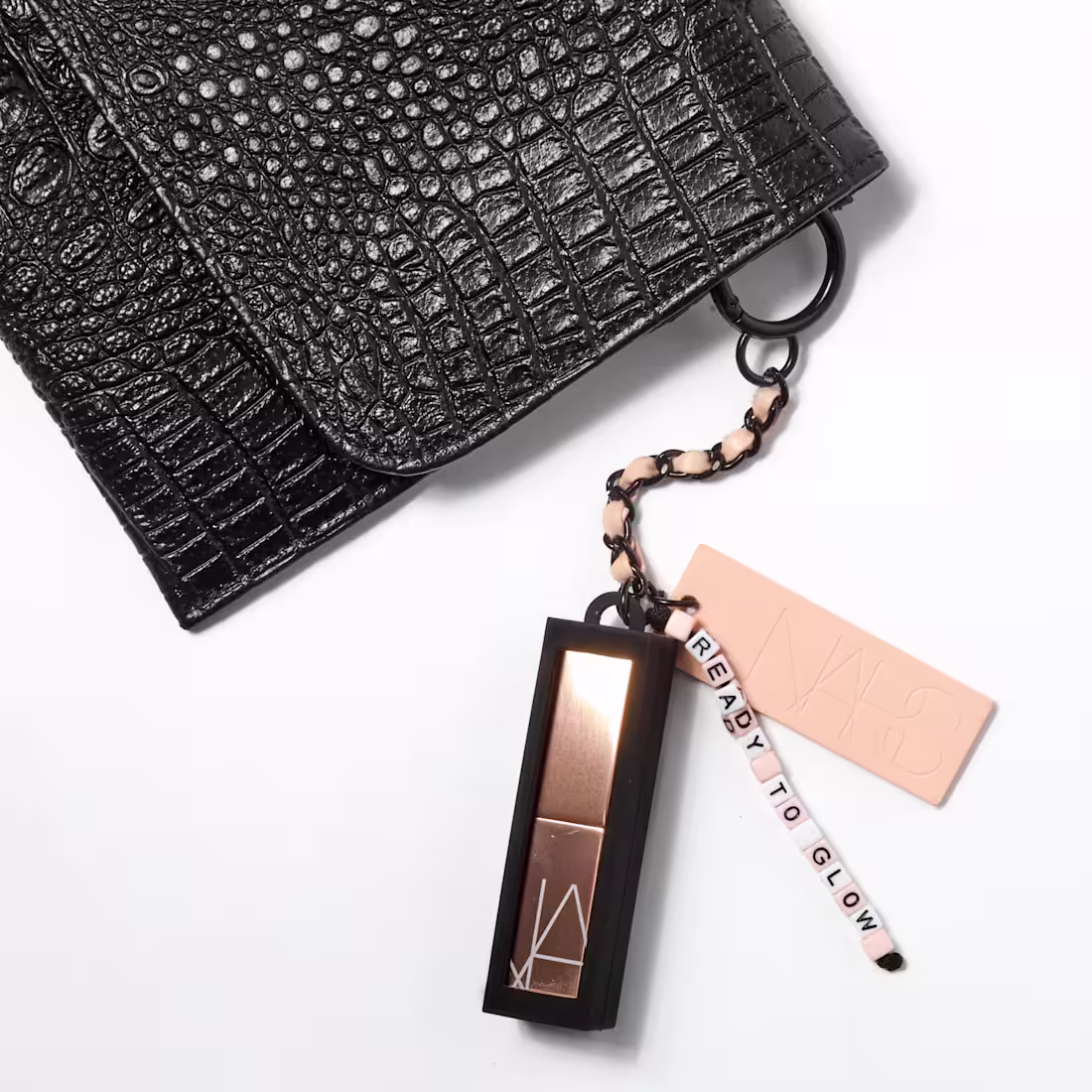 Cover image for NARS Afterglow Purse Charm
Merchandise Design