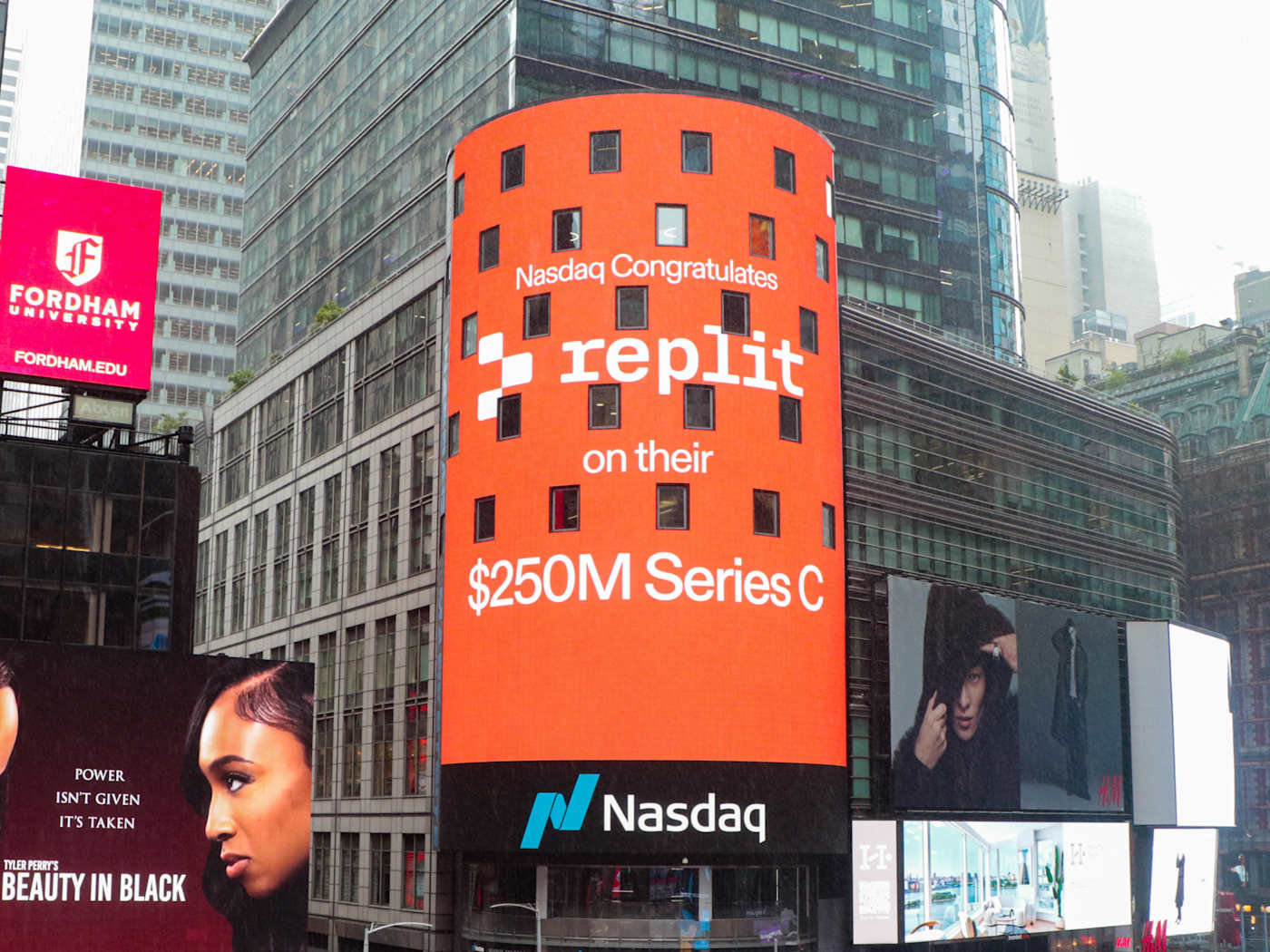 Replit Nasdaq Tower campaign designed by Tamer Oukour