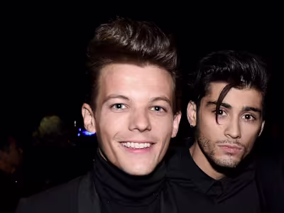 Louis Tomlinson Spotted at Zayn Malik’s Concert