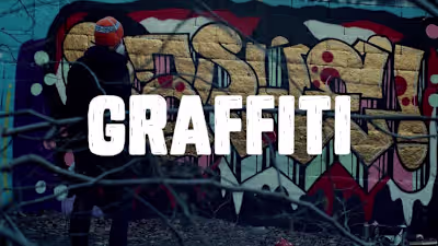 Graffiti with artist RAPHE