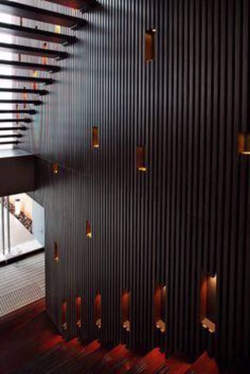 A Black Wood Slat Accent Wall for your Bedroom