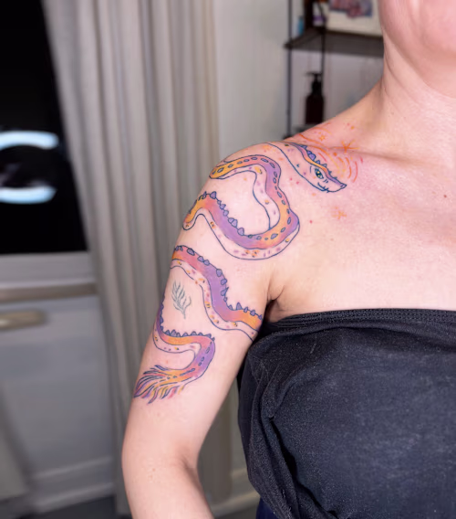 Free Spirit — Colorful Dragon Tattoo This tattoo tells the s...