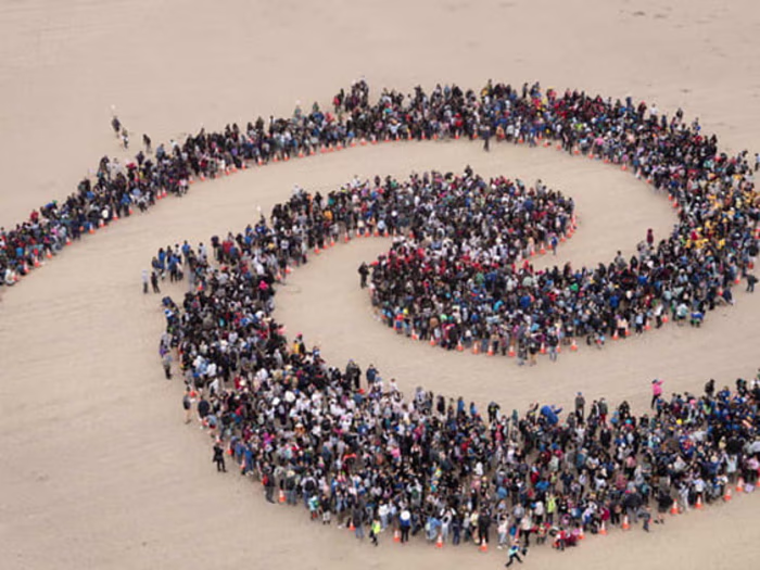 Kids Ocean Day NonProfit Beach Clean Up and Aerial Art Stunt