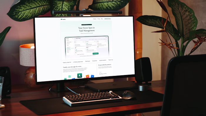 Taskily logo, SaaS dashboard concept, and landing page design