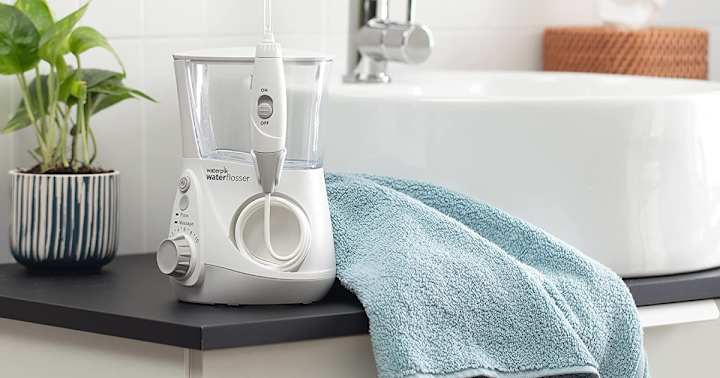 Cover image for Aquarius Water Flosser by Waterpik