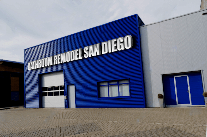 Cover image for commercial sign" with business name on front of industrial build