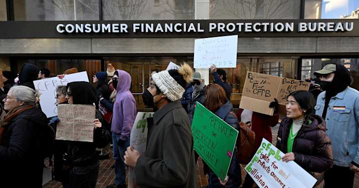 Cover image for Protests erupt after CFPB operations halted by acting director