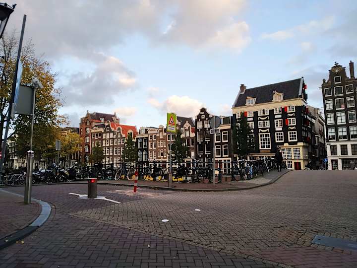 Cover image for Escaping Mass Tourism In Amsterdam: 4 Authentic Experiences