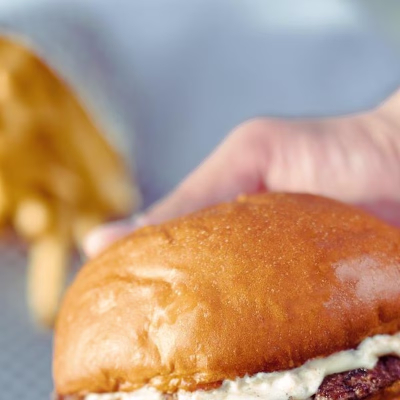 Cover image for With every crunch, our burgers pack a …