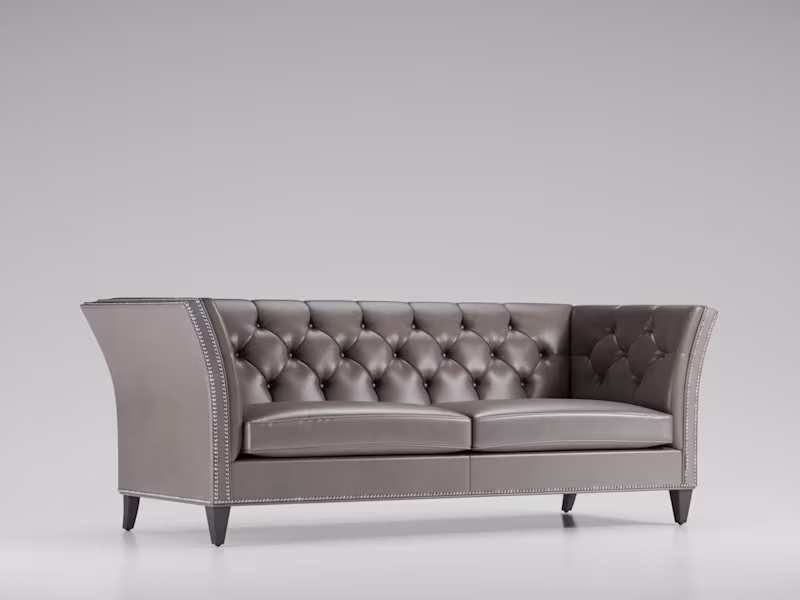 Cover image for This tufted leather sofa was crafted entirely in CGI to give...