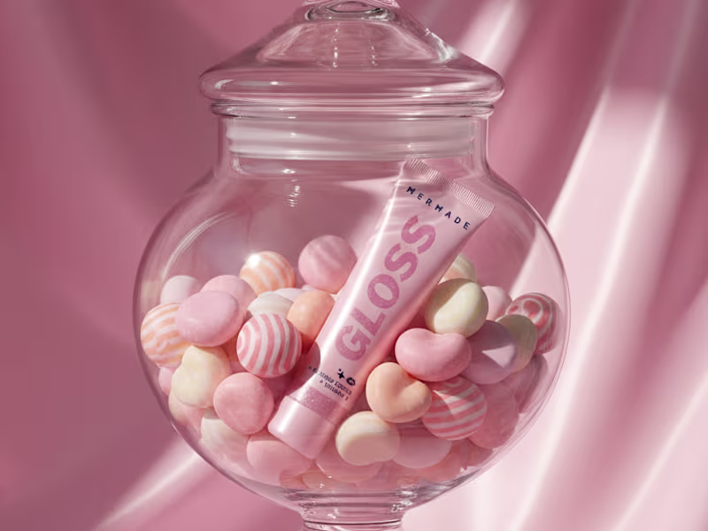 Cover image for MerMade Lip Gloss A playful glossy mermaid-style composition...