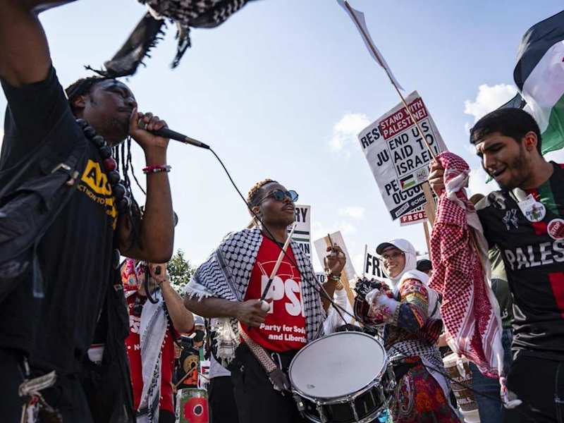 Cover image for Thousands gather in Union Park on first day of DNC to demand...