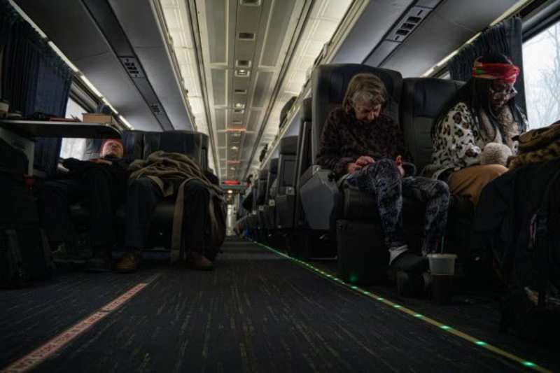 Cover image for Trump supporters ride train across country to attend inaugura...