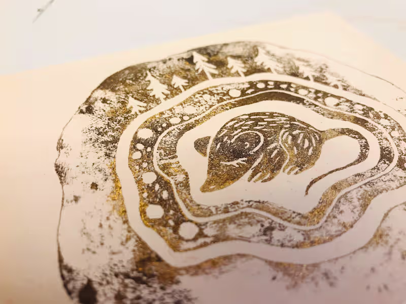 Cover image for Winter Mouse — Linocut Edition A small mouse sleeps peaceful...