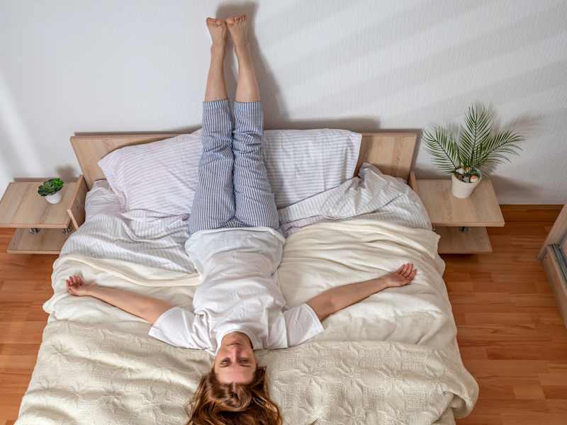 Cover image for 5 Easy Yoga Poses You Can Do From the Comfort of Your Bed