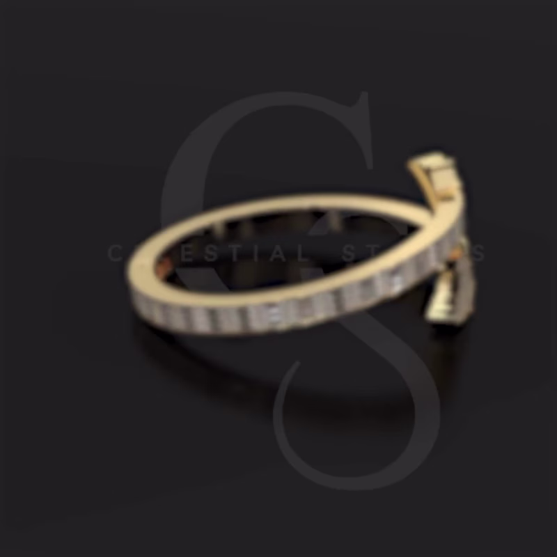 Cover image for A delicate golden band adorned with tiny diamonds that catch...